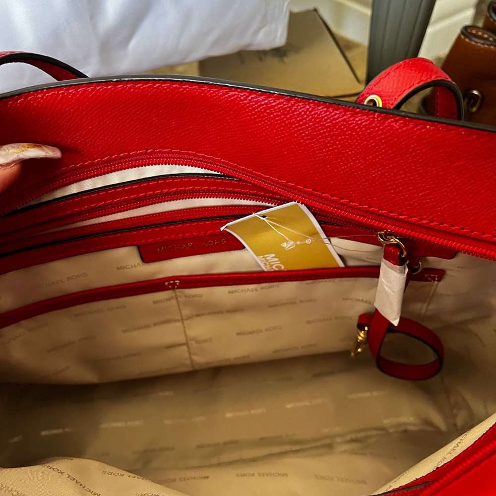 Mk voyager leather tote